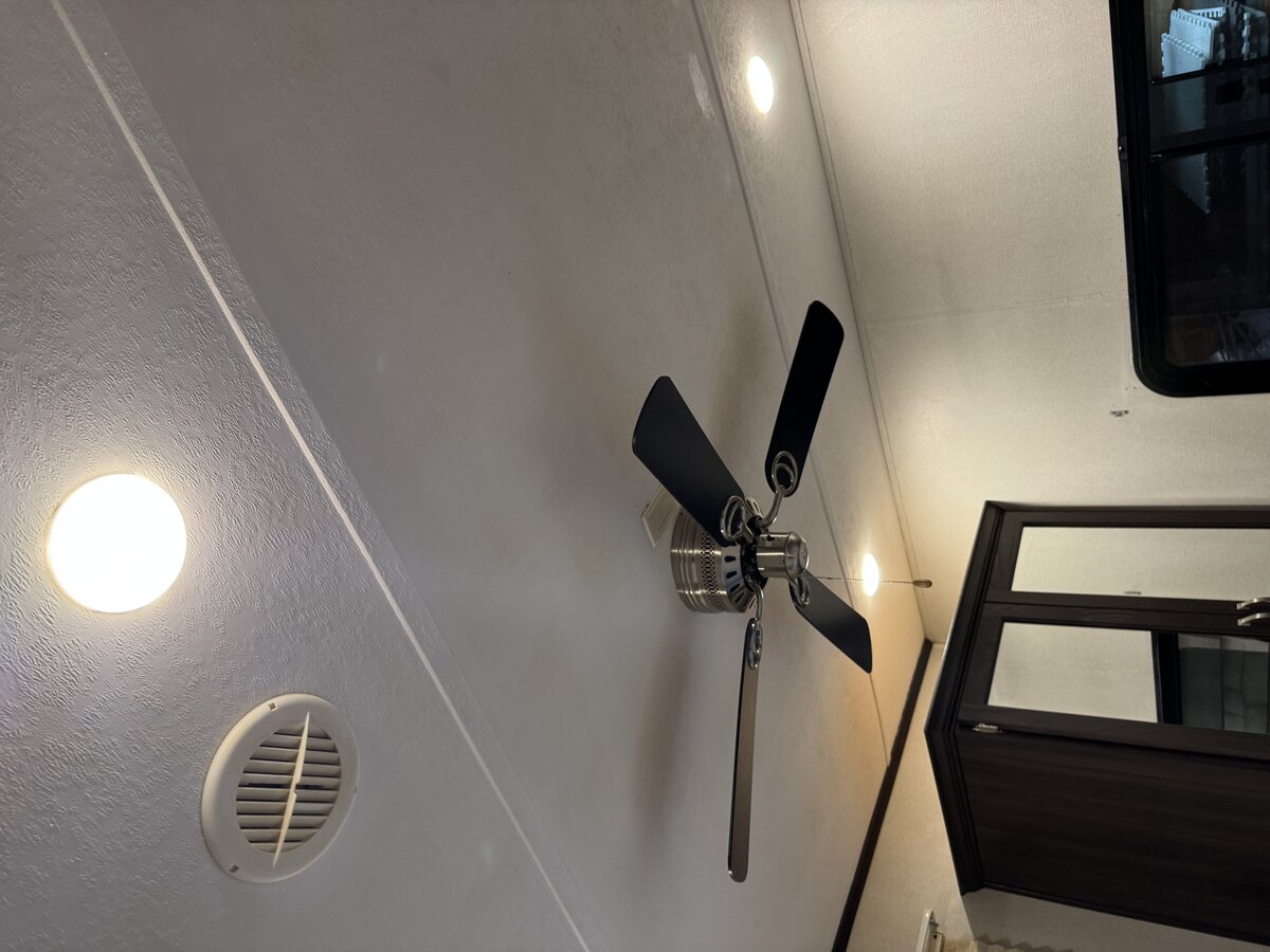 Bedroom ceiling after repaint, clean white finish